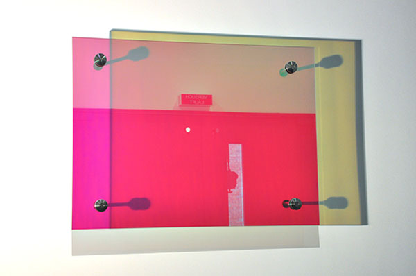 Site specific artwork. Wall hanging color changing glass panes. Installation University Rostock. YLS Yvonne Lee Schultz