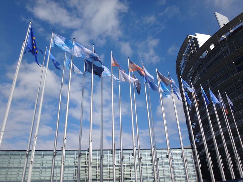 28 flags showing pictures of the sky above Europe instead of national flags in front of the European Parliament. Artwork by YLS Yvonne Lee Schultz 