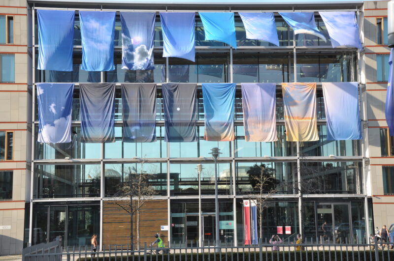 One Sky Flags fly in Berlin close to the Reichstag and unify the sky above all 16 Länder of Germany. Artwork by YLS Yvonne Lee Schultz